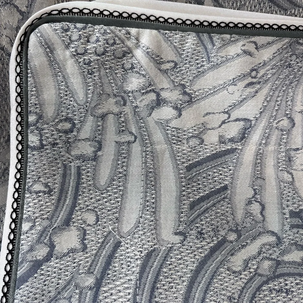 A pair of standard Yves Delorme pillow shams.